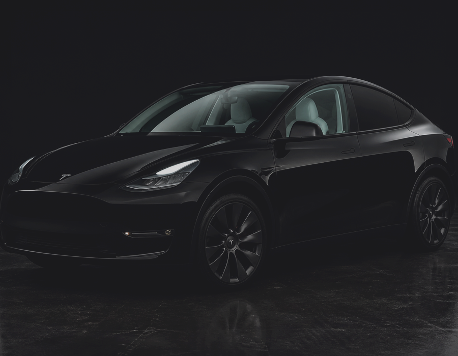 Black Tesla with Solar Ceramic on two front windows